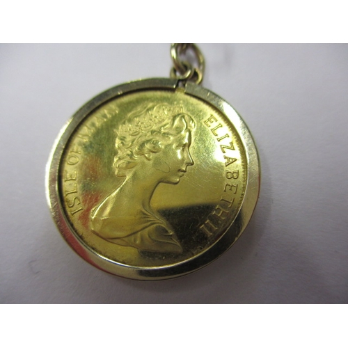 130 - A 1981 Isle of Man gold half sovereign in 9ct mount with yellow metal chain, approx. parcel weight 6... 