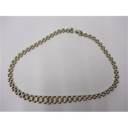 74 - A vintage 9ct yellow gold choker necklace, approx. linear length 38cm, approx. weight 16.8g in useab... 