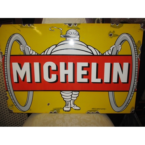 A late 20th century enamel advertising sign for Michelin tyres, approx. size 60x40, some staining and enamel loss to edges