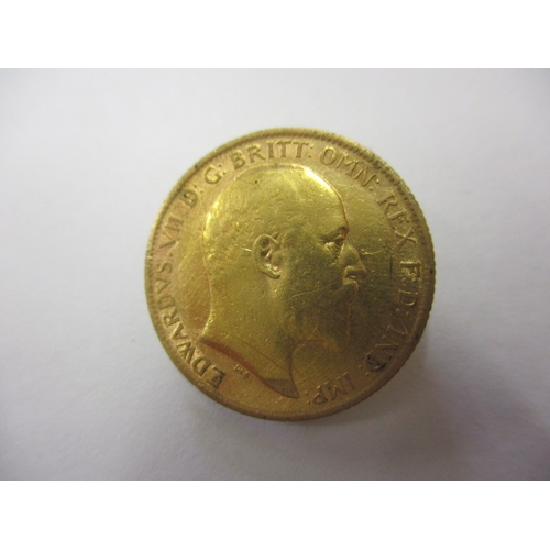 132 - An Edward VII gold half sovereign dated 1906, a circulated coin with good definition of features