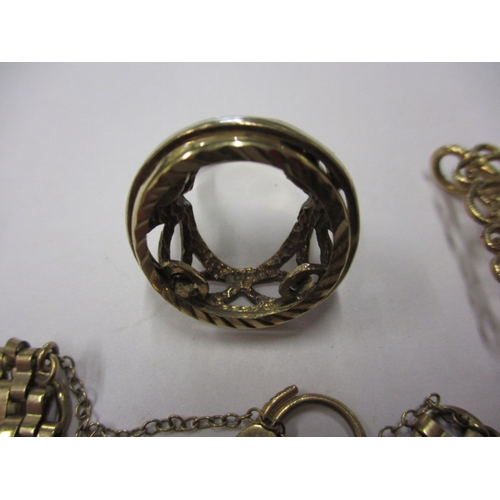 76 - A parcel of gold and yellow metal items, to include a gate bracelet, approx. parcel weight 28g, all ... 