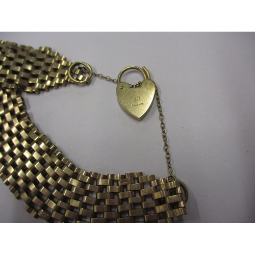 76 - A parcel of gold and yellow metal items, to include a gate bracelet, approx. parcel weight 28g, all ... 