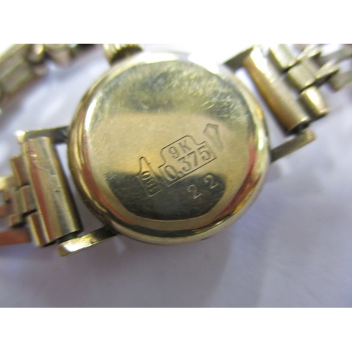 110 - A 9ct gold bracelet and cocktail watch, matching designs, no safety chain and watch not tested, appr... 