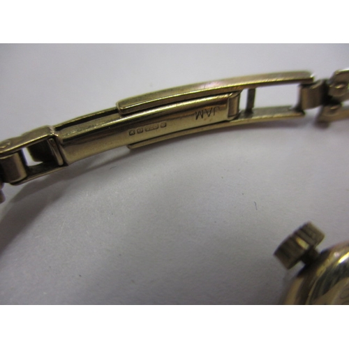 110 - A 9ct gold bracelet and cocktail watch, matching designs, no safety chain and watch not tested, appr... 