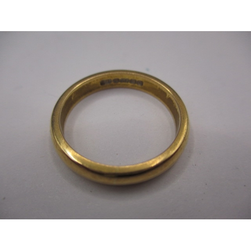 38 - A 22ct yellow gold wedding band, approx. ring size ‘O’, approx. width 3.5mm, approx. weight 5.4g, in... 