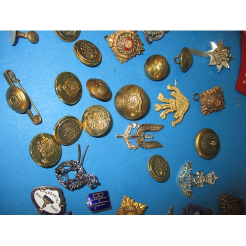 219 - A parcel of WWII and later military and civilian insignia and some replica medals, all in used condi... 