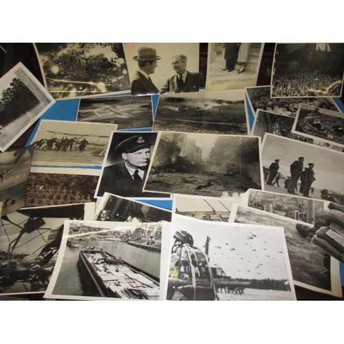 220 - A quantity of original WWII press photographs, all in used condition