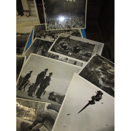 220 - A quantity of original WWII press photographs, all in used condition