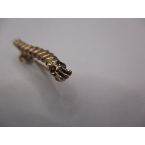 108 - A WWII gold Caterpillar club pin badge, inscribed verso L.A.C. J Spencer, an unofficial award for pe... 