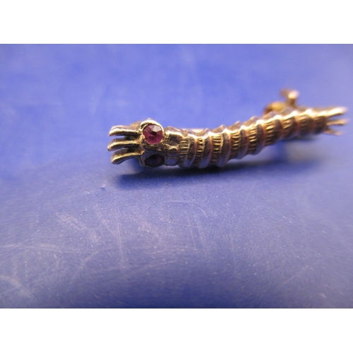 108 - A WWII gold Caterpillar club pin badge, inscribed verso L.A.C. J Spencer, an unofficial award for pe... 