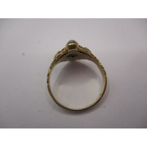 34 - An antique Georgian 18ct gold ring, with central diamond surrounded by pearls, approx. ring size ‘N’... 