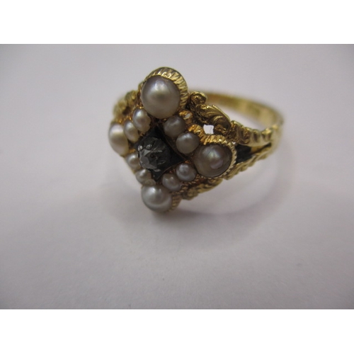 34 - An antique Georgian 18ct gold ring, with central diamond surrounded by pearls, approx. ring size ‘N’... 