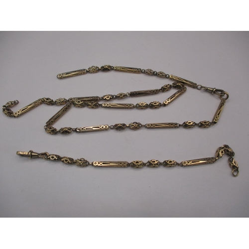 83 - An antique 9ct gold watch chain, approx. weight 25.5g, used condition with a broken link