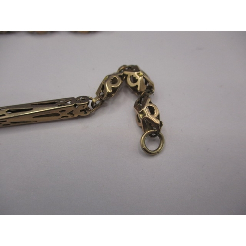 83 - An antique 9ct gold watch chain, approx. weight 25.5g, used condition with a broken link