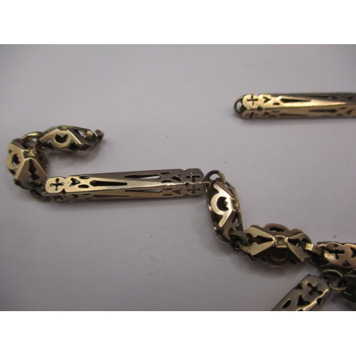 83 - An antique 9ct gold watch chain, approx. weight 25.5g, used condition with a broken link