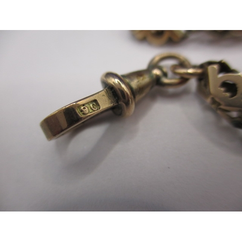 83 - An antique 9ct gold watch chain, approx. weight 25.5g, used condition with a broken link