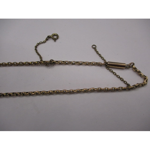 87 - An unmarked yellow metal necklace chain with working clasp and safety chain, approx. linear length 4... 