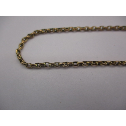 87 - An unmarked yellow metal necklace chain with working clasp and safety chain, approx. linear length 4... 