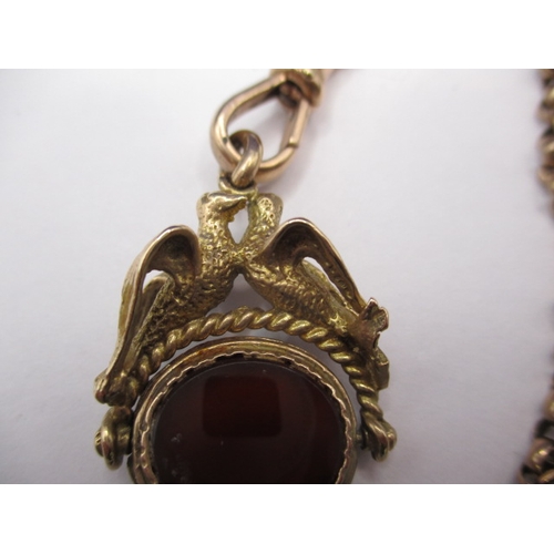 88 - An antique 9ct gold watch chain with hardstone fob, approx. linear length 48cm , approx. gross weigh... 