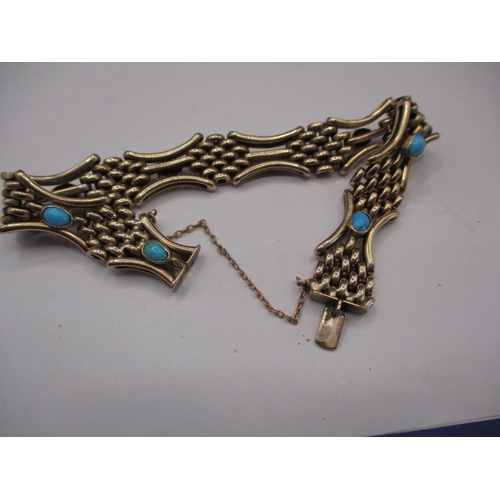 89 - A vintage 9ct yellow gold bracelet with turquoise stud decoration, approx. weight 17.5g, in useable ... 