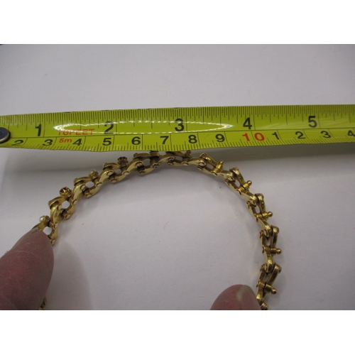 90 - A vintage expanding gold bracelet, marked 15ct, approx. weight 18.2g in useable pre-owned condition