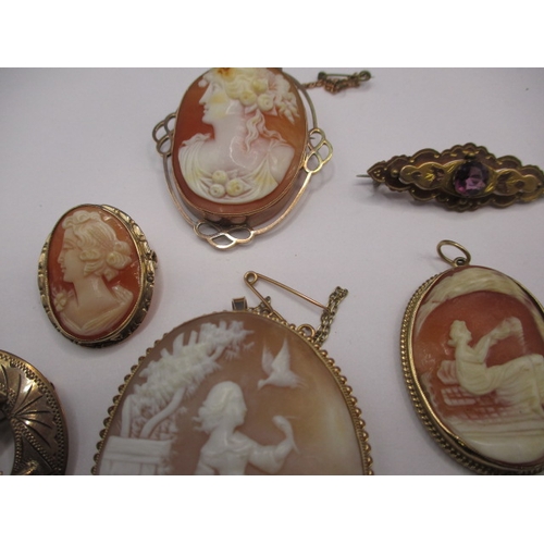 109 - A large collection of antique and later brooches and pendants, most marked for 9ct gold, some yellow... 