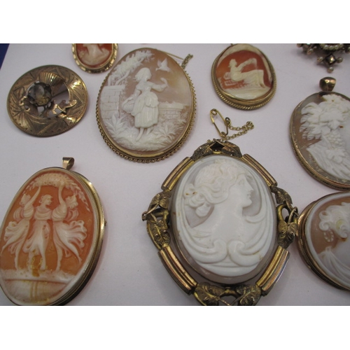 109 - A large collection of antique and later brooches and pendants, most marked for 9ct gold, some yellow... 