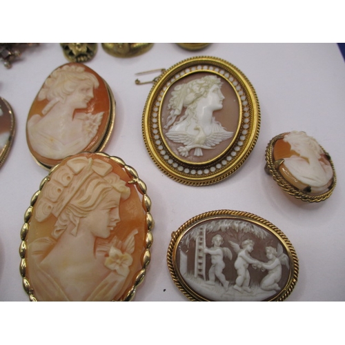 109 - A large collection of antique and later brooches and pendants, most marked for 9ct gold, some yellow... 