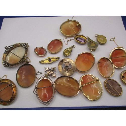 109 - A large collection of antique and later brooches and pendants, most marked for 9ct gold, some yellow... 