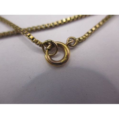 94 - Three antique 9ct gold necklace pendants and a gold chain, approx. gross parcel weight 10.3g, all in... 