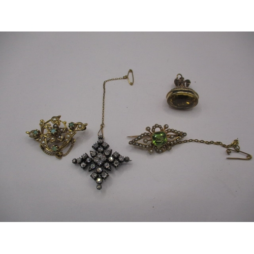 105 - 3 Antique brooches and a fob seal, one set with multiple white stones that electronically test as di... 