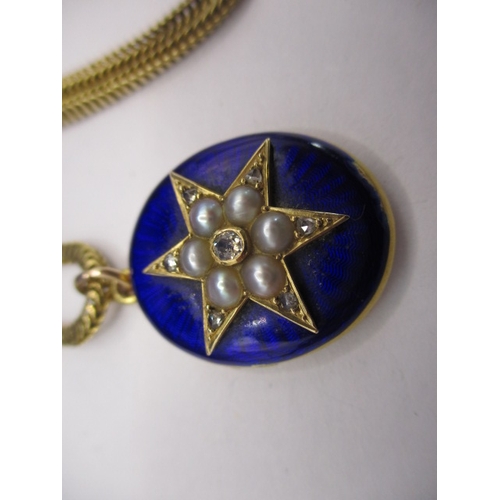 96 - An 18ct gold and blue enamel pendant, having a central star motif set with diamonds and pearls, with... 