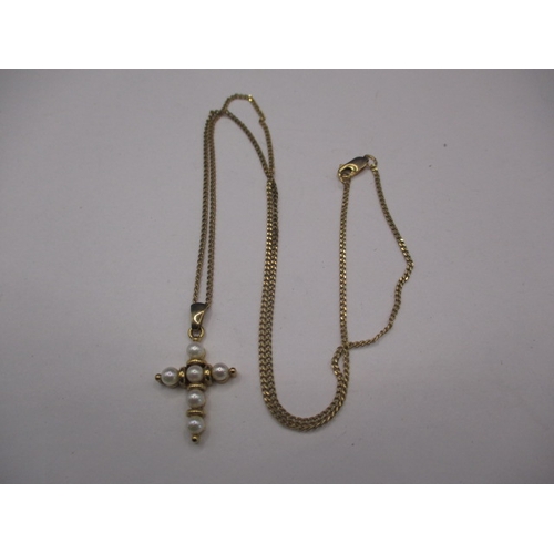 98 - A 9ct gold necklace and pendant in the form of a cross set with pearls, approx. linear length 52cm, ... 