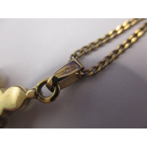 98 - A 9ct gold necklace and pendant in the form of a cross set with pearls, approx. linear length 52cm, ... 