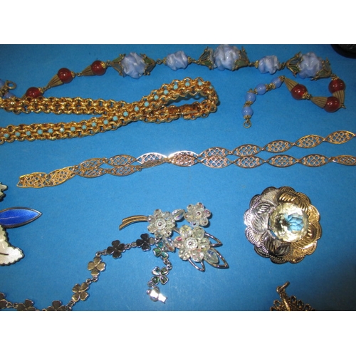 176 - A large quantity of antique and later costume jewellery, to include some silver items, all in used c... 