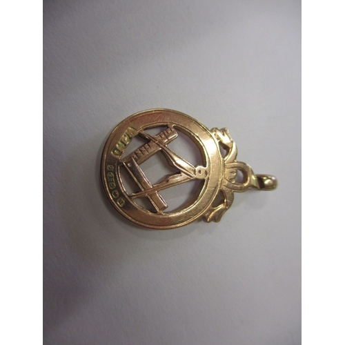 103 - A 9ct rose gold masonic pendant, approx. weight 3.8g in useable pre-owned condition