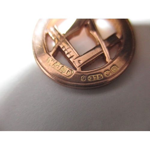 103 - A 9ct rose gold masonic pendant, approx. weight 3.8g in useable pre-owned condition