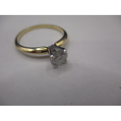 15 - A 14ct yellow gold diamond solitaire ring, the stone being approx. 0.60ct, approx. ring size ‘M+’ ap... 