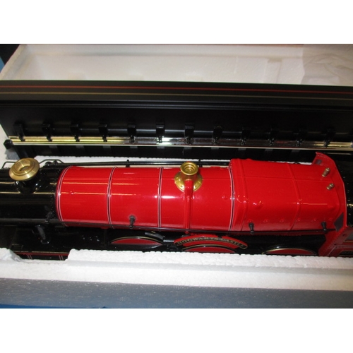 328 - Two Harry Potter Hogwarts Express 1:50 scale die-cast models, each in original boxed condition