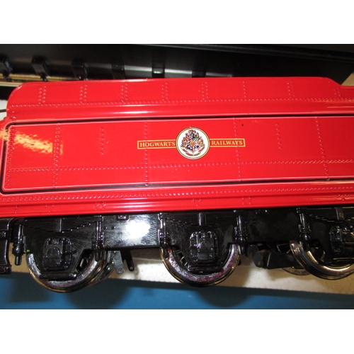 328 - Two Harry Potter Hogwarts Express 1:50 scale die-cast models, each in original boxed condition