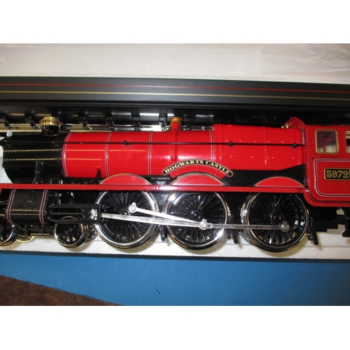 328 - Two Harry Potter Hogwarts Express 1:50 scale die-cast models, each in original boxed condition