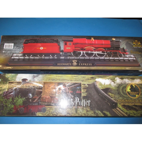 328 - Two Harry Potter Hogwarts Express 1:50 scale die-cast models, each in original boxed condition