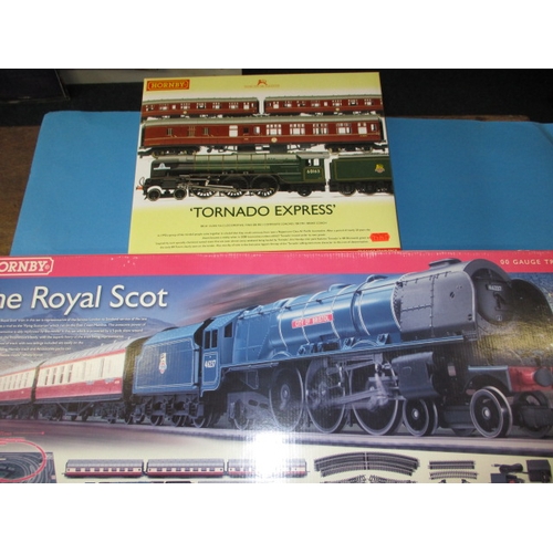 329 - Two boxed Hornby ‘00’ gauge railway sets, The Royal Scot and Tornado Express, both in original boxes