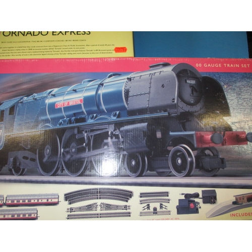 329 - Two boxed Hornby ‘00’ gauge railway sets, The Royal Scot and Tornado Express, both in original boxes