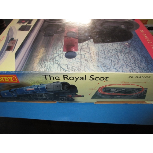 329 - Two boxed Hornby ‘00’ gauge railway sets, The Royal Scot and Tornado Express, both in original boxes