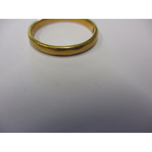 52 - A 22ct yellow gold wedding band, approx. ring size ‘K’, approx. width 2.3mm, approx. weight 2.15g, i... 