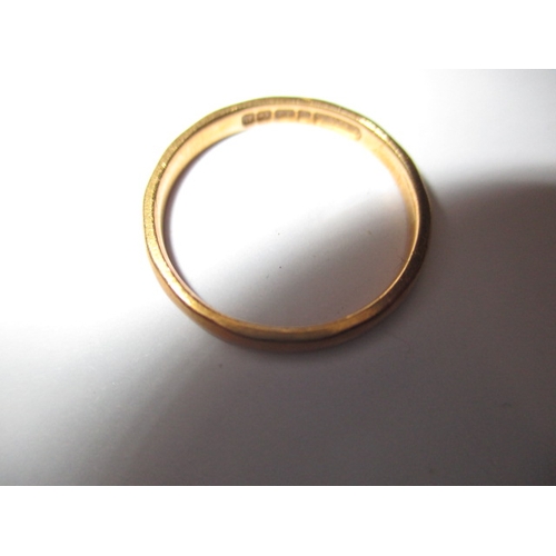 52 - A 22ct yellow gold wedding band, approx. ring size ‘K’, approx. width 2.3mm, approx. weight 2.15g, i... 