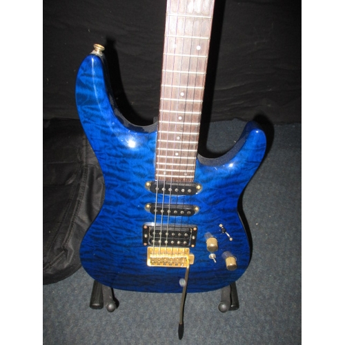 315 - An Aria MAC-series electric guitar, with stand and soft carry case. In pre-owned condition