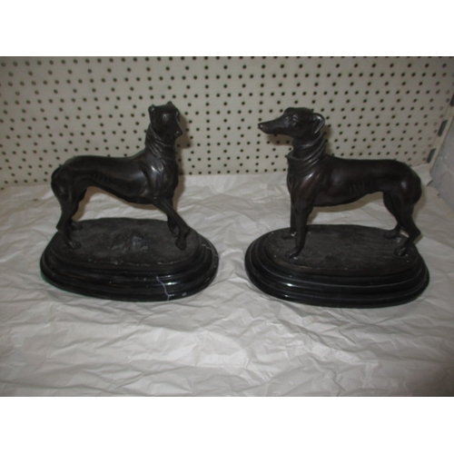 293 - Two cast bronze greyhounds on marble bases, after Mene, approx. height 22cm in good pre-owned condit... 