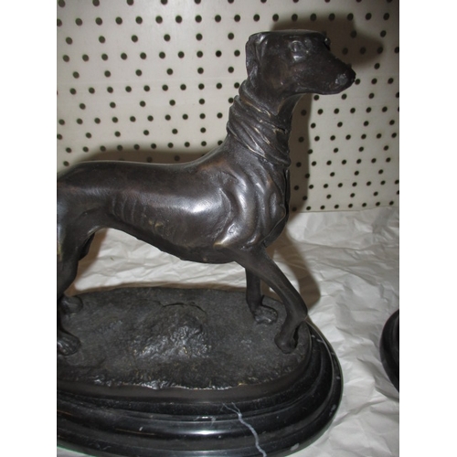 293 - Two cast bronze greyhounds on marble bases, after Mene, approx. height 22cm in good pre-owned condit... 